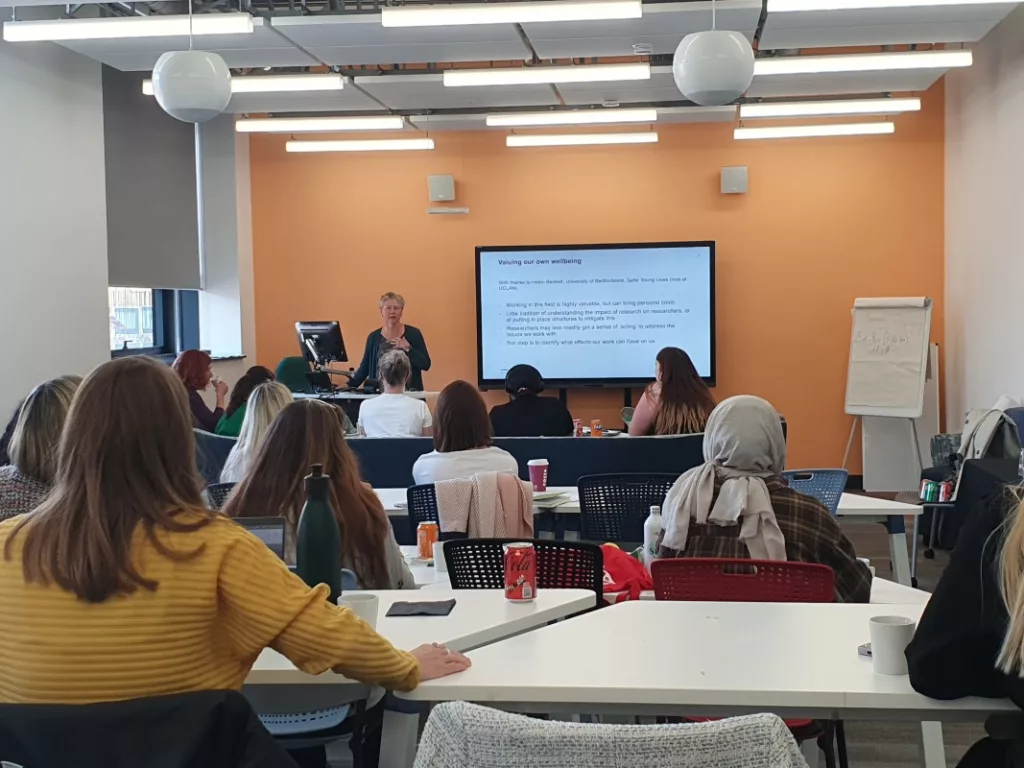 Image of Sophie Laws, Deputy Director at the CSA Centre, presenting to PhD students at the 2024 workshop