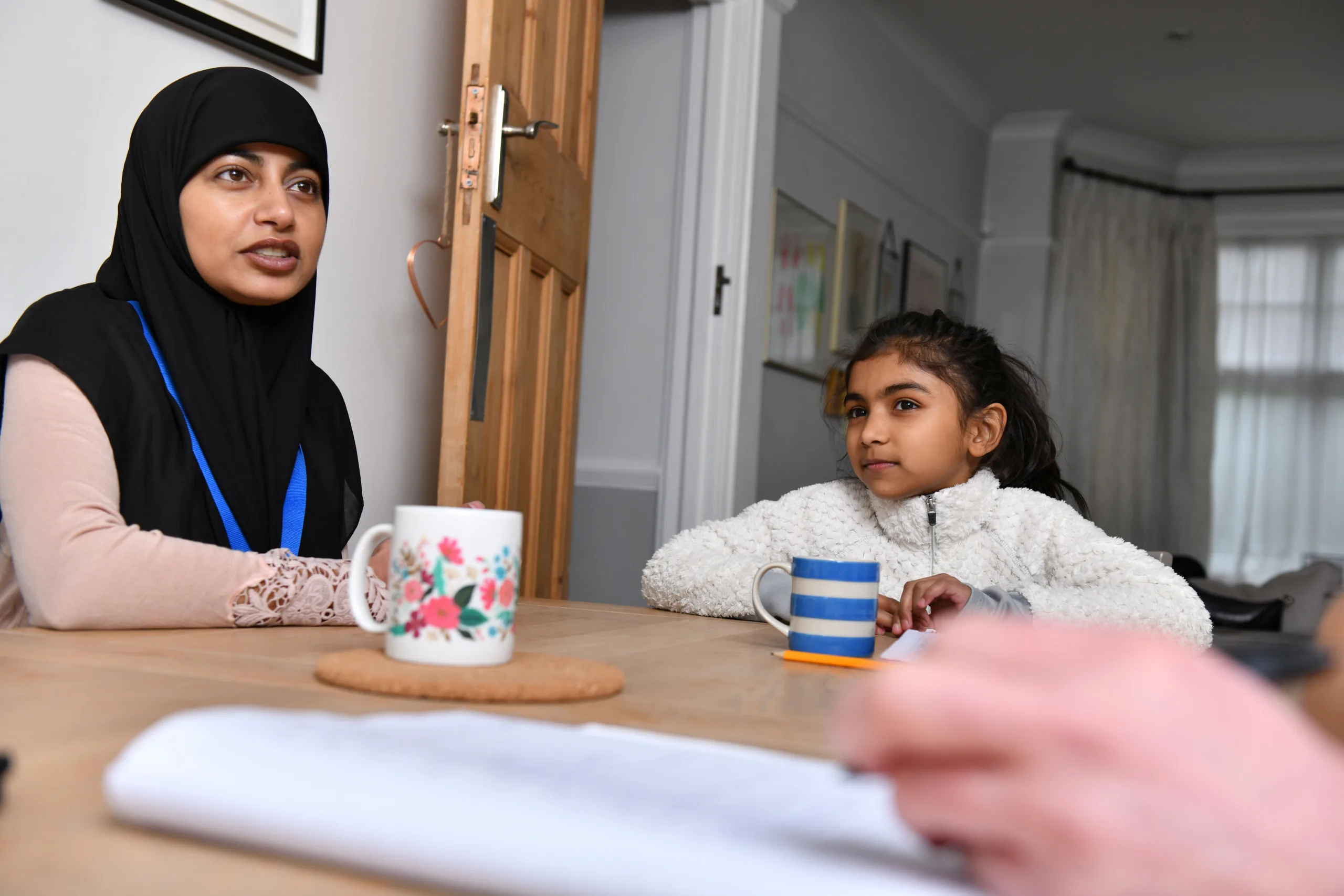 Professional talking to child